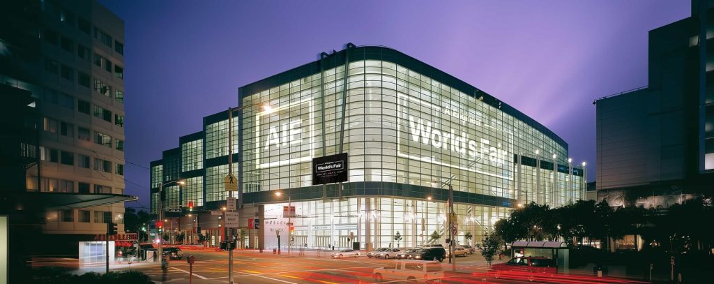 Moscone West illuminated with AI Engineer World’s Fair branding at a previous edition